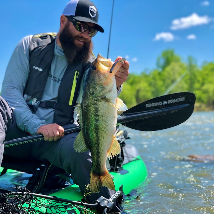 kayak angler with a big fish