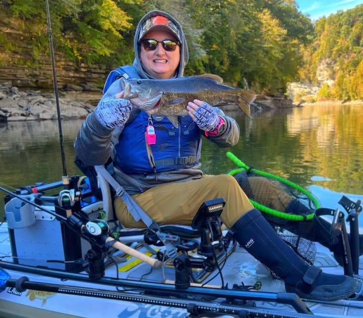 Bending Branches' Ambassador CJ Bennett with a fish on her kayak