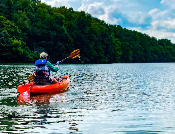 CJ kayaks a rec kayak with her Navigator paddle
