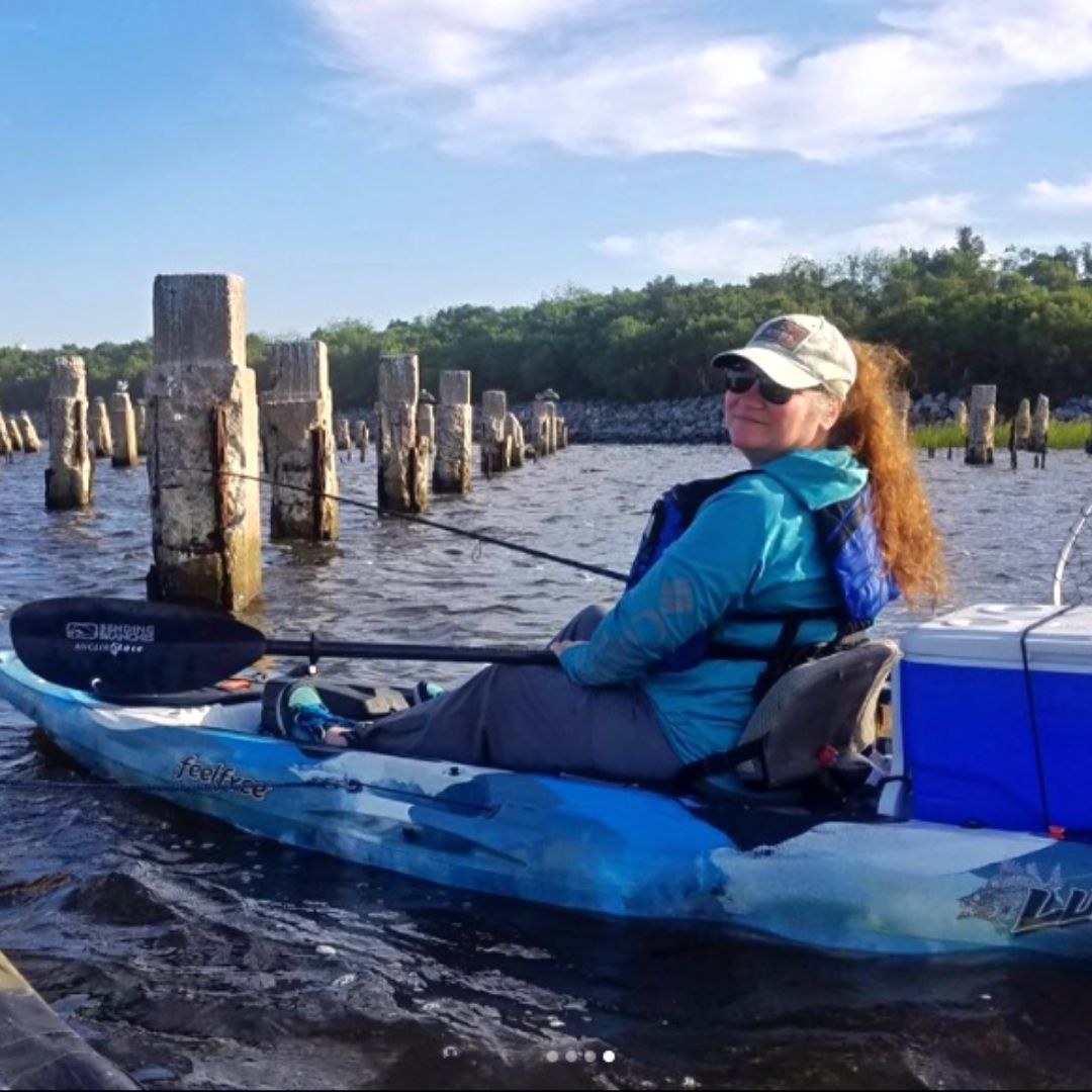 Rhonda Phillips fishing from her kayak