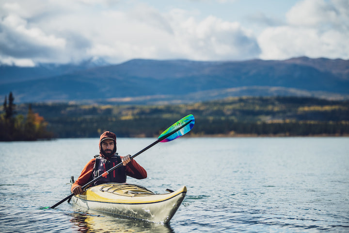 kayaker with Aqua Bound Tango Fiberglass kayak paddle