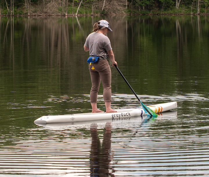 woman paddleboarding