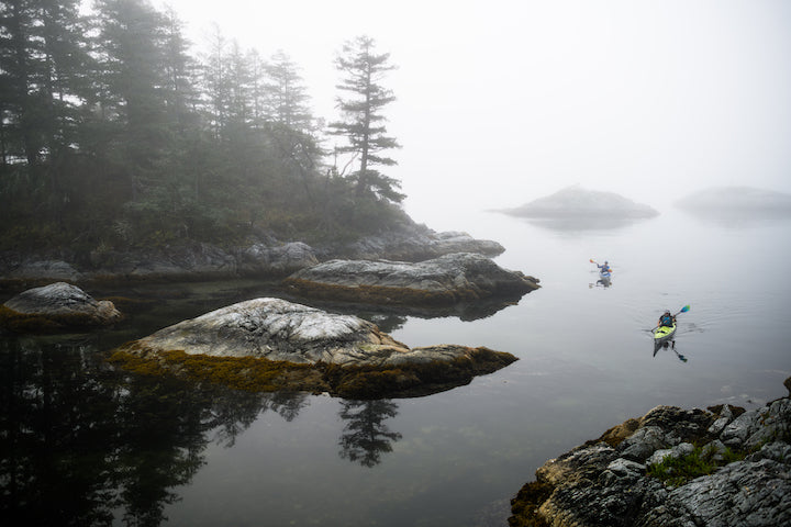 kayakers on still water