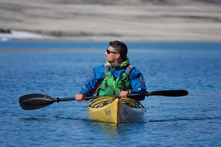 man in a sea kayak