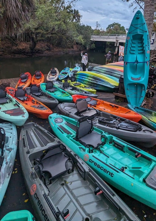 kayaks lined up on Estero River Outfitters' dock