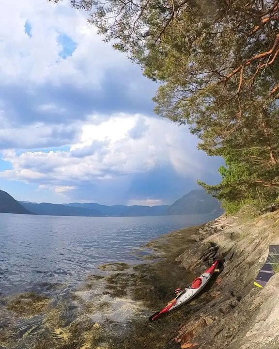 sea kayak on the shore of a fjord in Norway