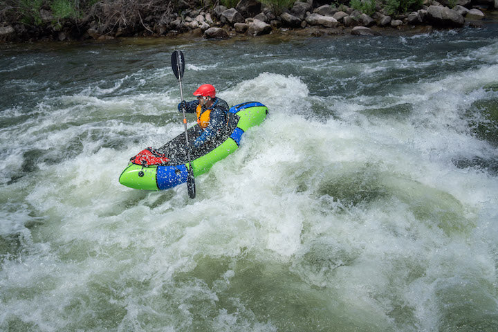 packrafter in big rapids