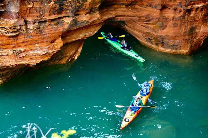 kayakers sea caves lake superior