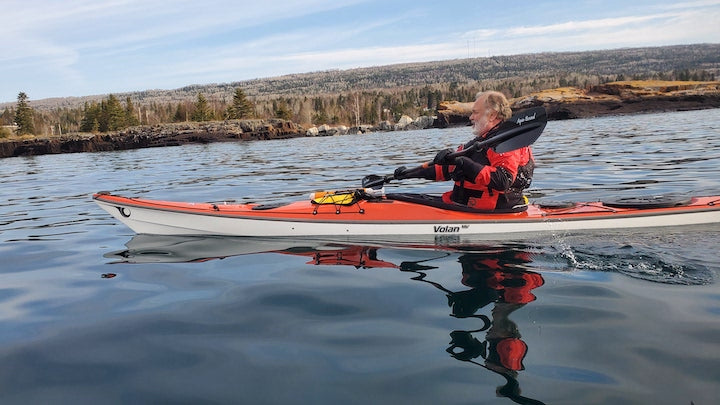 kayaker on lake superior's minnesota shore