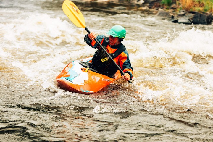 man whitewater kayaking
