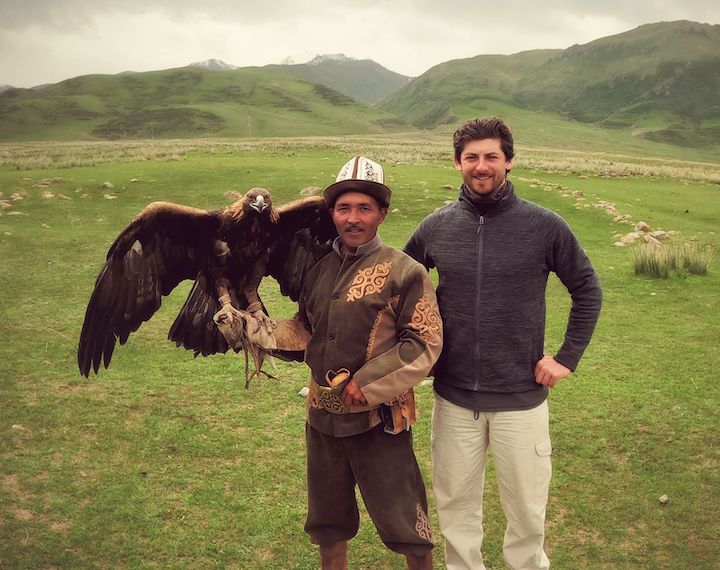 Kyrgyz man with his eagle and Hugo