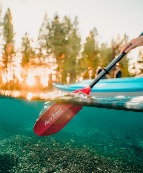 Aqua Bound's Manta Ray Hybrid paddle in Sunset Red