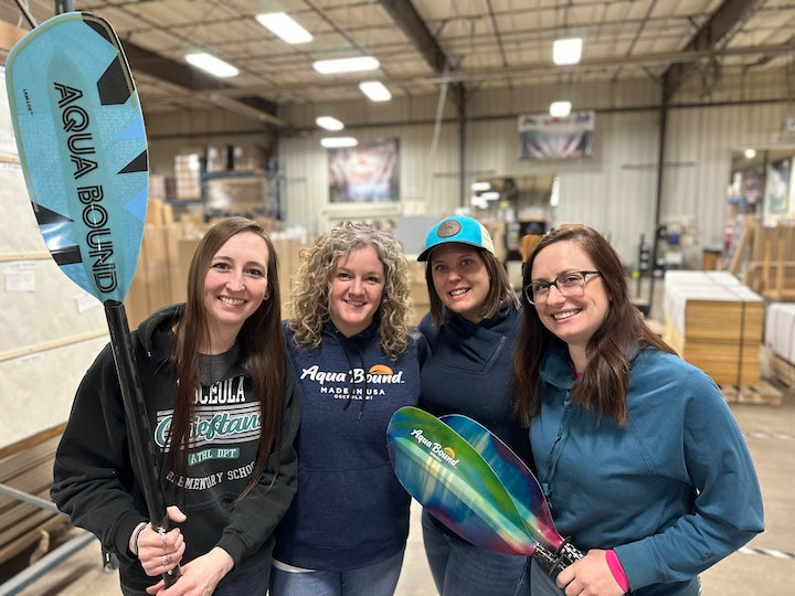 Aqua Bound's working moms with a few kayak paddles: Justine, Susie, Kate, Luanne