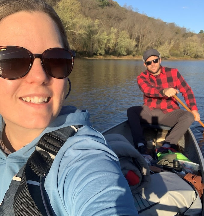 Kate and Adam in a loaded canoe