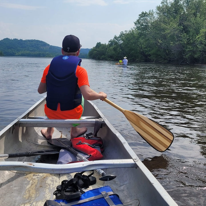 family canoe trip on a local river