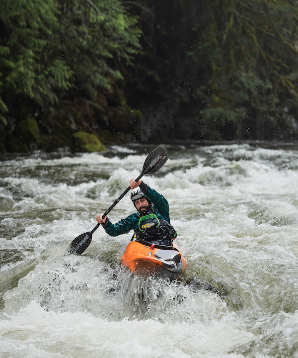 Mitch Sheridan kayaking whitewater on Oregon's Bull Run River