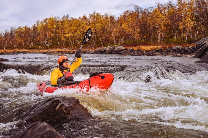 packrafter in rapids