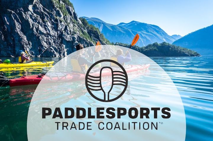 Paddlesports Trade Coalition logo over an image of kayakers in a mountainous area