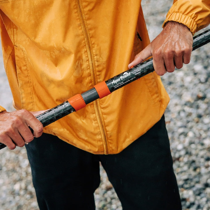 kayaker demonstrates Posi-Lok ferrule system