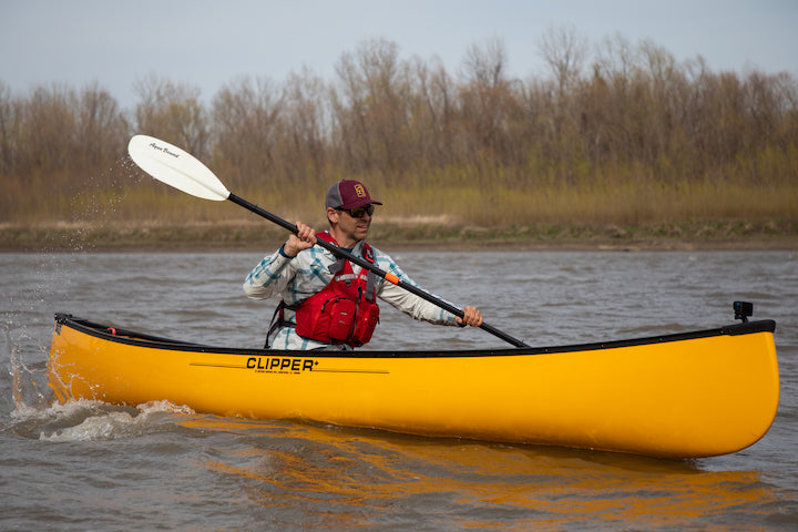 Ken Whiting uses a Manta Ray Hybrid paddling a solo canoe