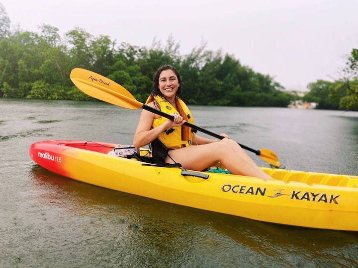 woman on a sit-on-top kayak