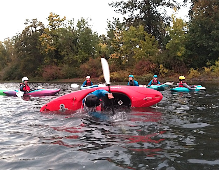 kids kayak class, practicing kayak rolling