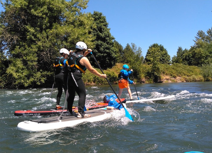 kids SUP class on whitewater