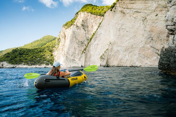 Electric Green Manta Ray being paddled in Zakynthos Greece