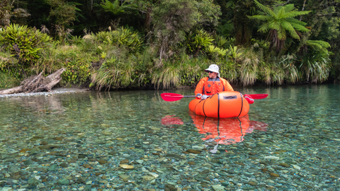 Paddling over the crystal clear water