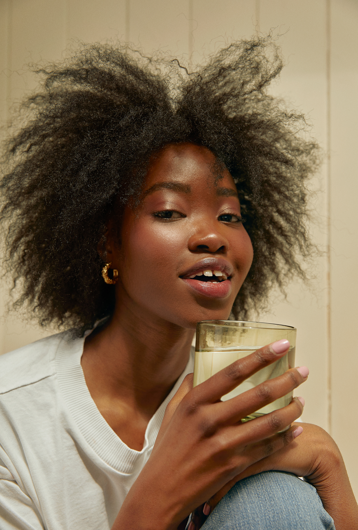 Woman drinking water from a glass