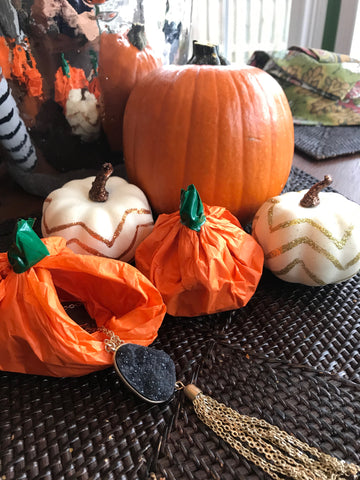 A craft showing how to make a pumpkin out of tissue paper.  Perfect for Fall and Halloween themed gifts! Could include candy, jewelry and more!