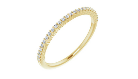 A half eternity band of tiny diamonds