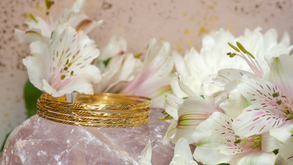 22K gold bangle bracelets with flowers at Oaks Jewelry in Gainesville FL