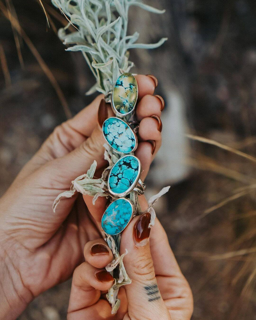 turquoise rings by @goldenroadcrafted on Instagram