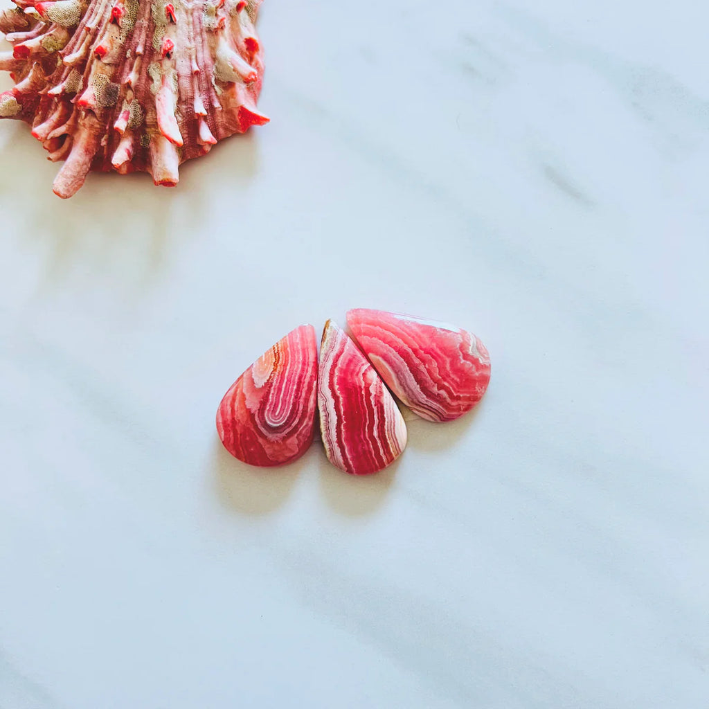 Genuine rhodochrosite cabs