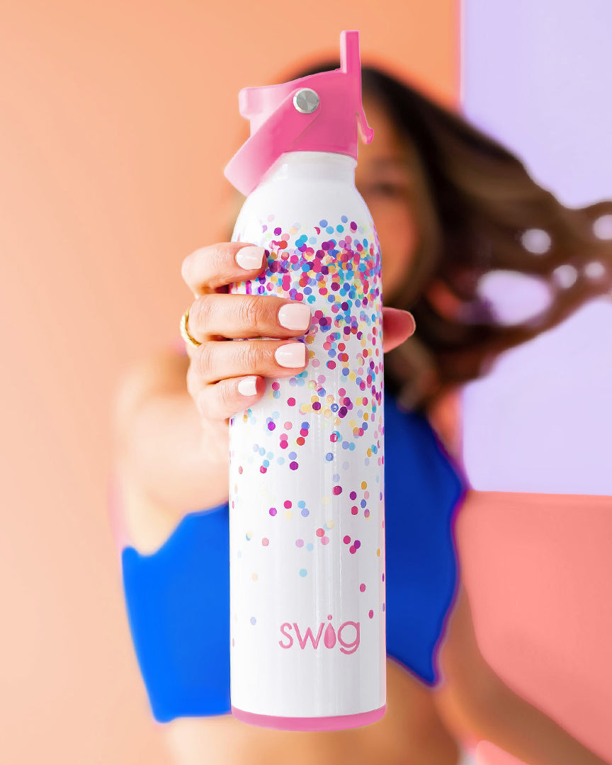 Young Woman Holding a Swig Life Confetti 20oz Water Bottle