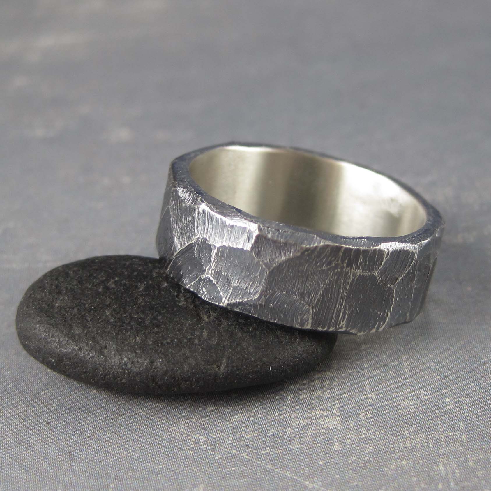 Rough hewn sterling silver wedding band with custom inscription