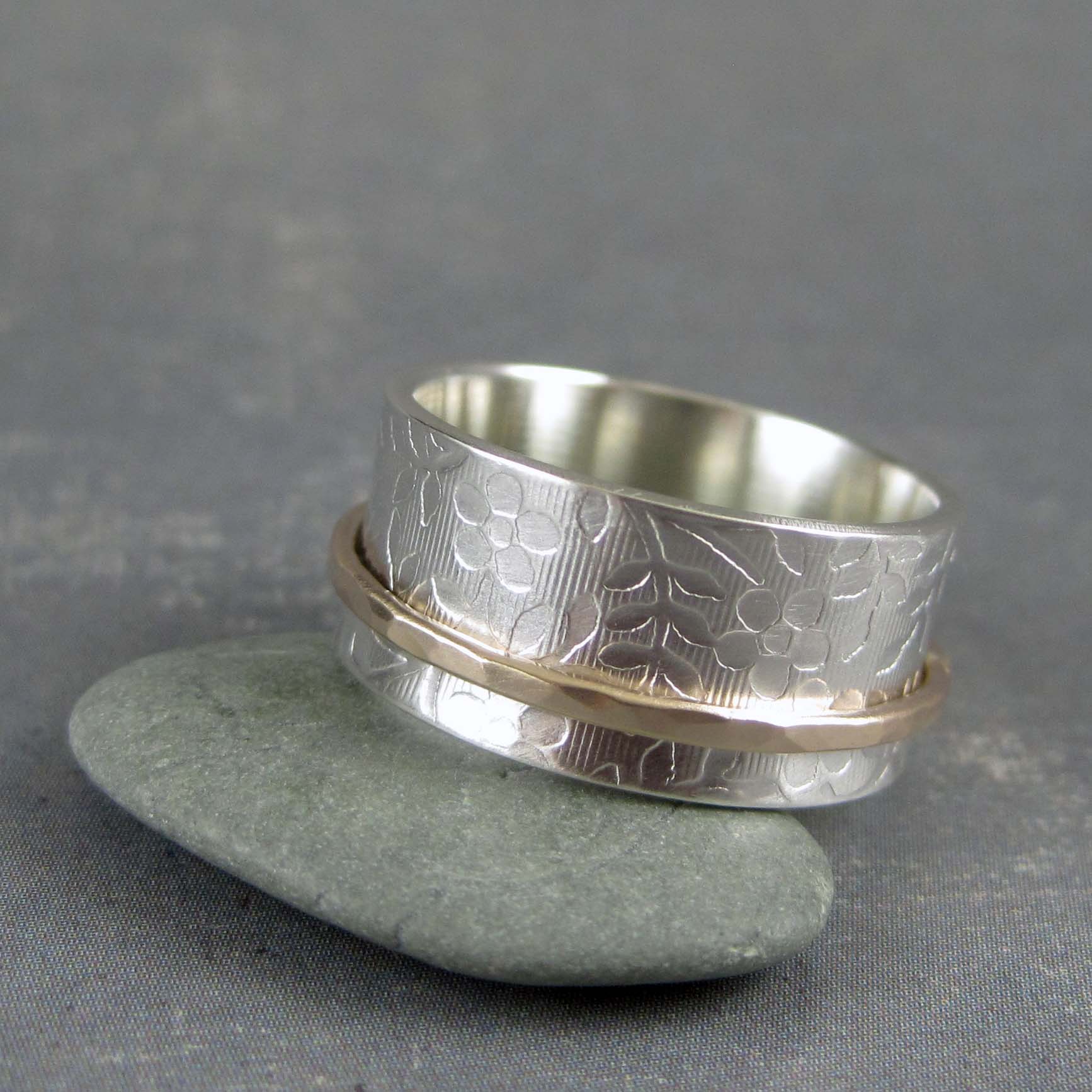 Custom inscription floral spinner ring in gold and sterling silver