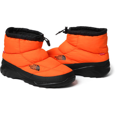 north face supreme orange