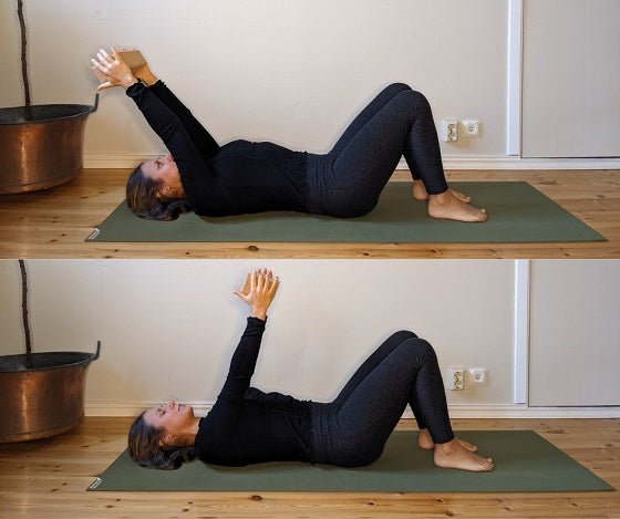 supine core activation with block