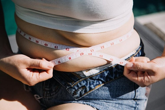 weight gain lower abdomen menopause