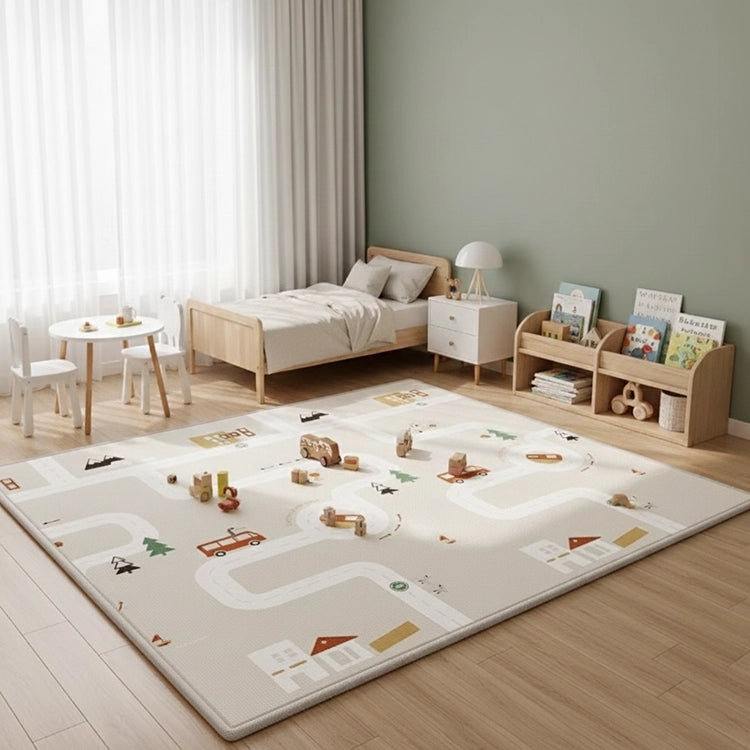 Children's room with a play mat, toys, and furniture.
