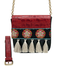 Embossed red & black leather bag with tassels. “Life Mechanism”.