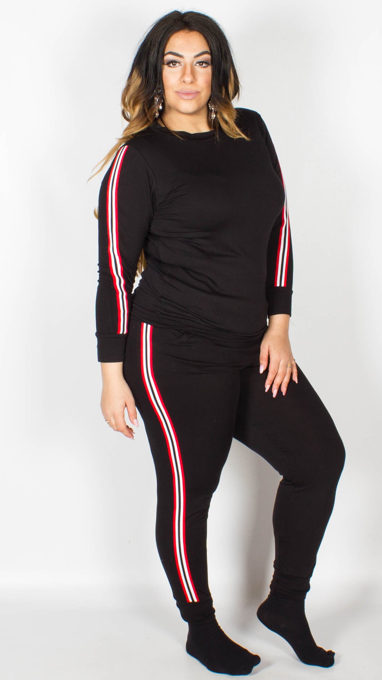 red tracksuit with white stripes