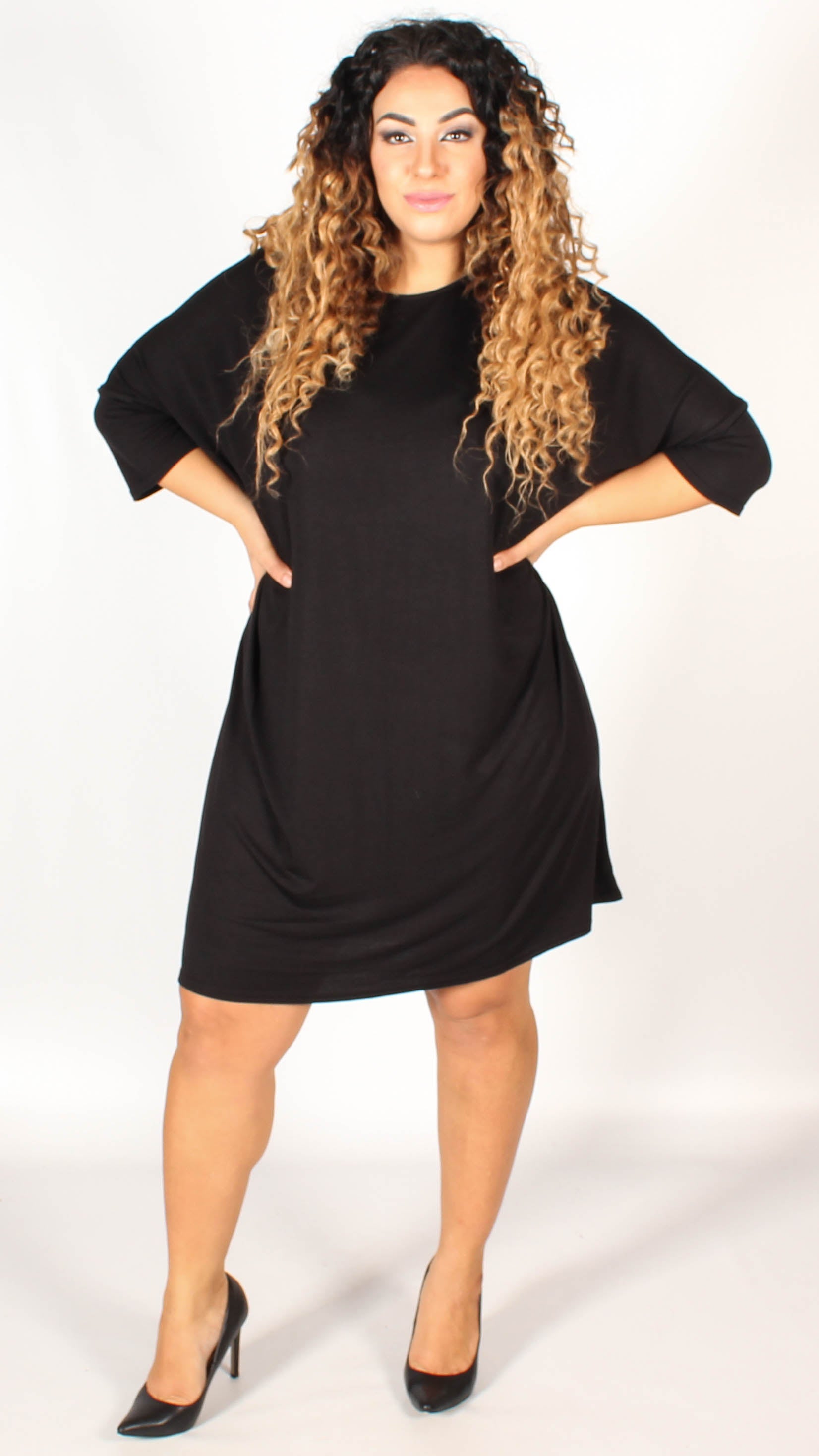 black dress with three quarter length sleeves