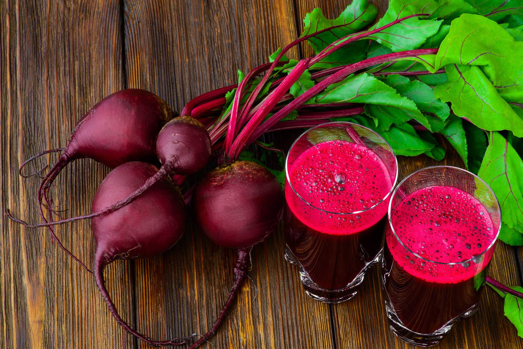 beets and glasses of beet juice