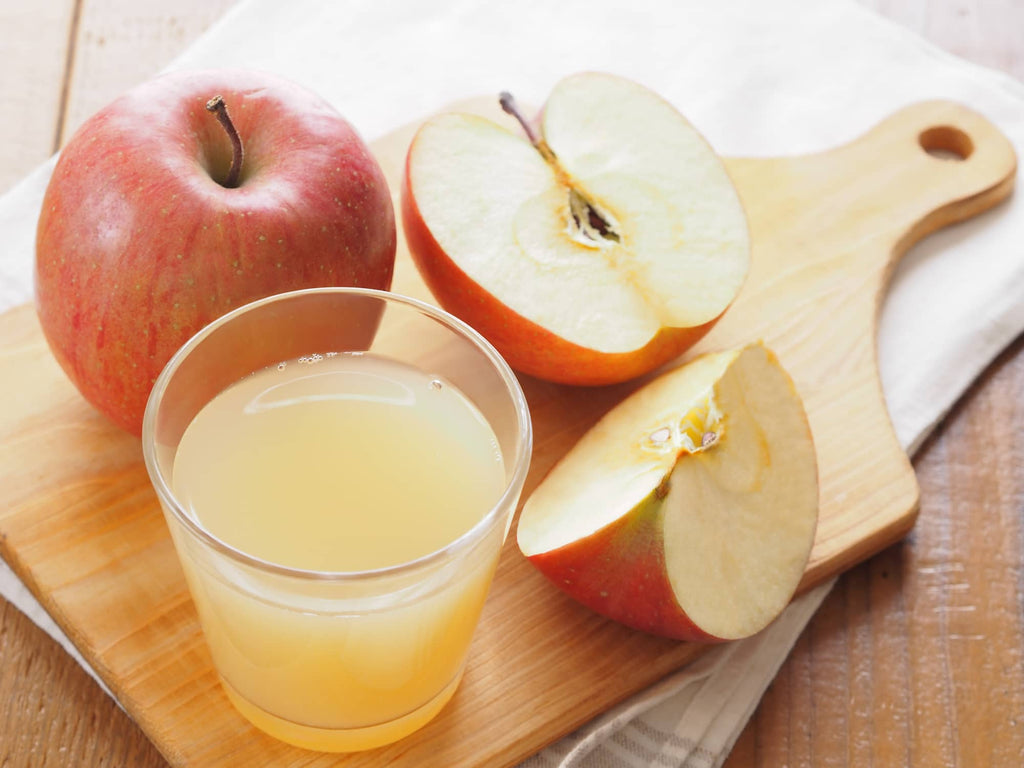 apples on a cutting board