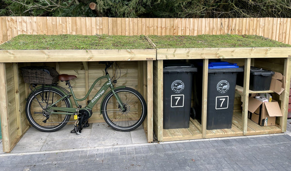 Bespoke garden storage for bikes, wheelie bins and recycling bins, with a living green roof planter for sedum