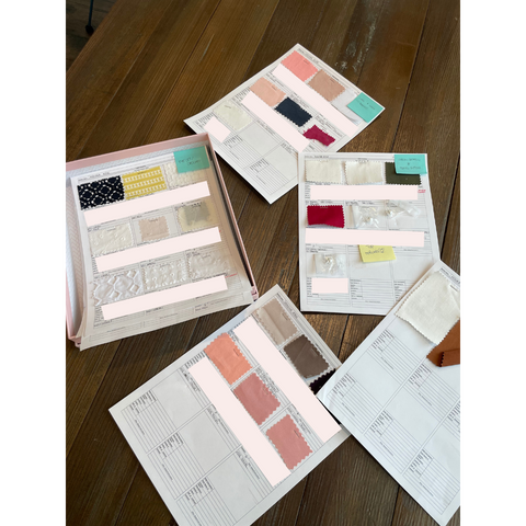 Fabric swatches laid out on a table 