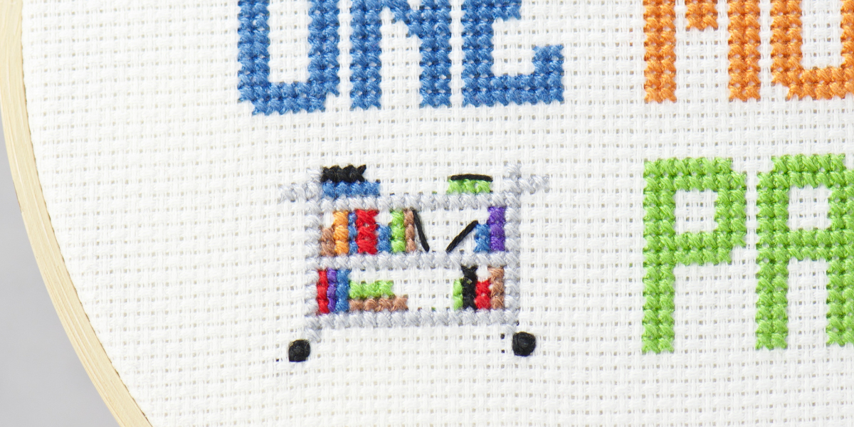 just one more page cross stitch pattern of book cart for librarians